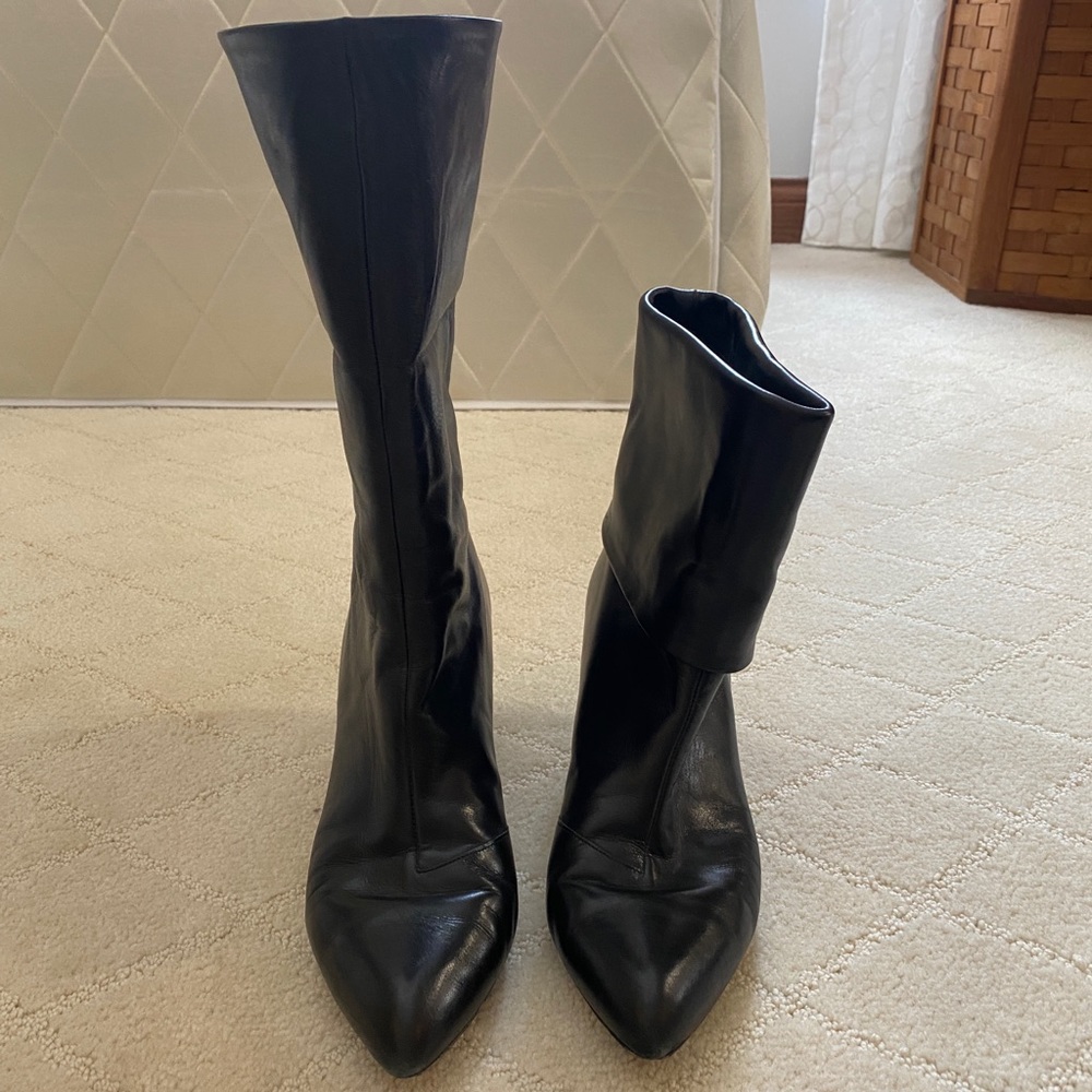 Louis Vuitton black booties can be worn up or down.   Versatile and simple.